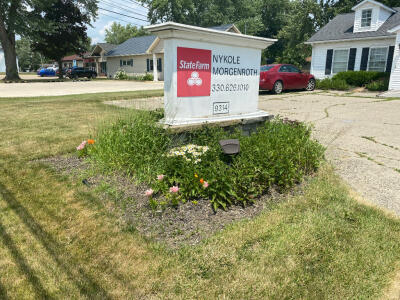 Before cleanup, maintenance, & landscaping done on commercial property by Chestnut Landscaping